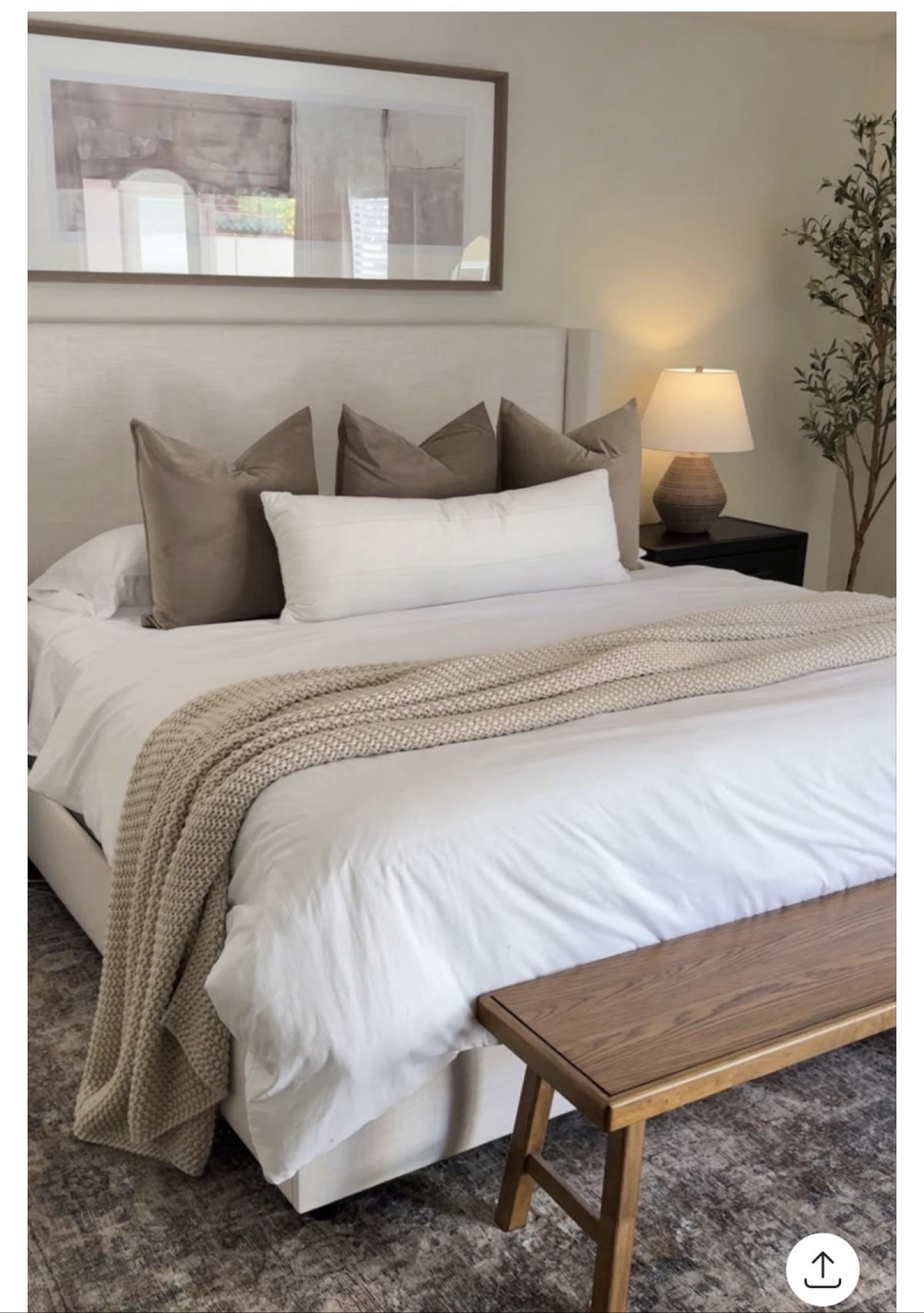 Bedroom with made bed